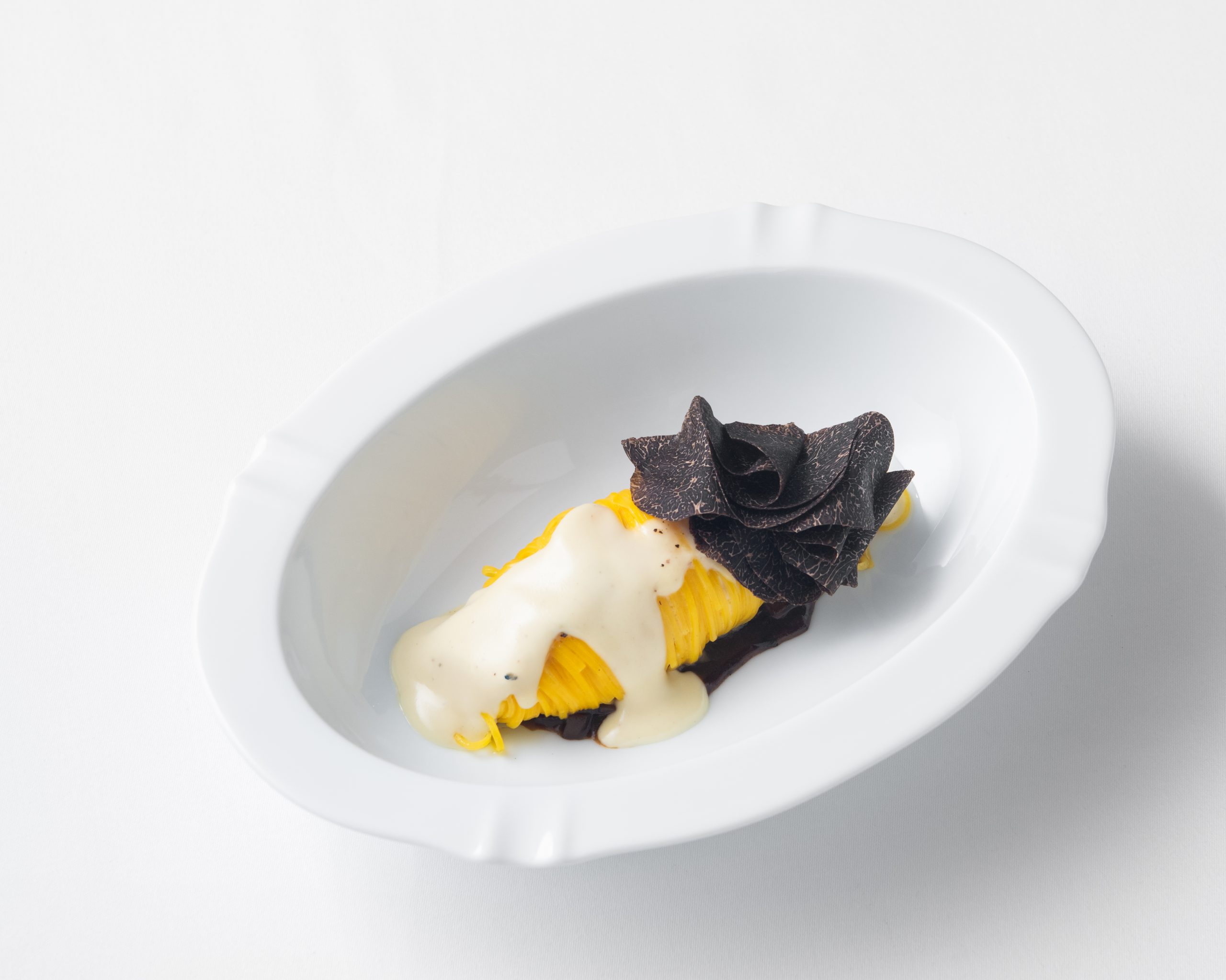 Tagliolini served at Cannubi by Umberto Bombana in Bangkok