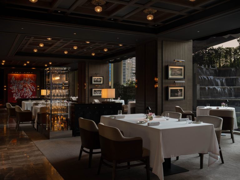 Cannubi by Umberto Bombana dining room overlooking the Dusit Thani waterfall
