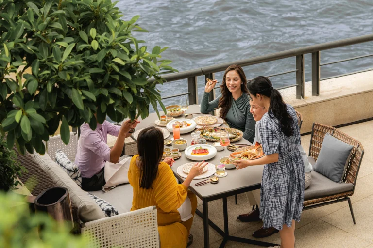 Open-air dining beside the Chao Phraya River at Chao Phraya Terrace