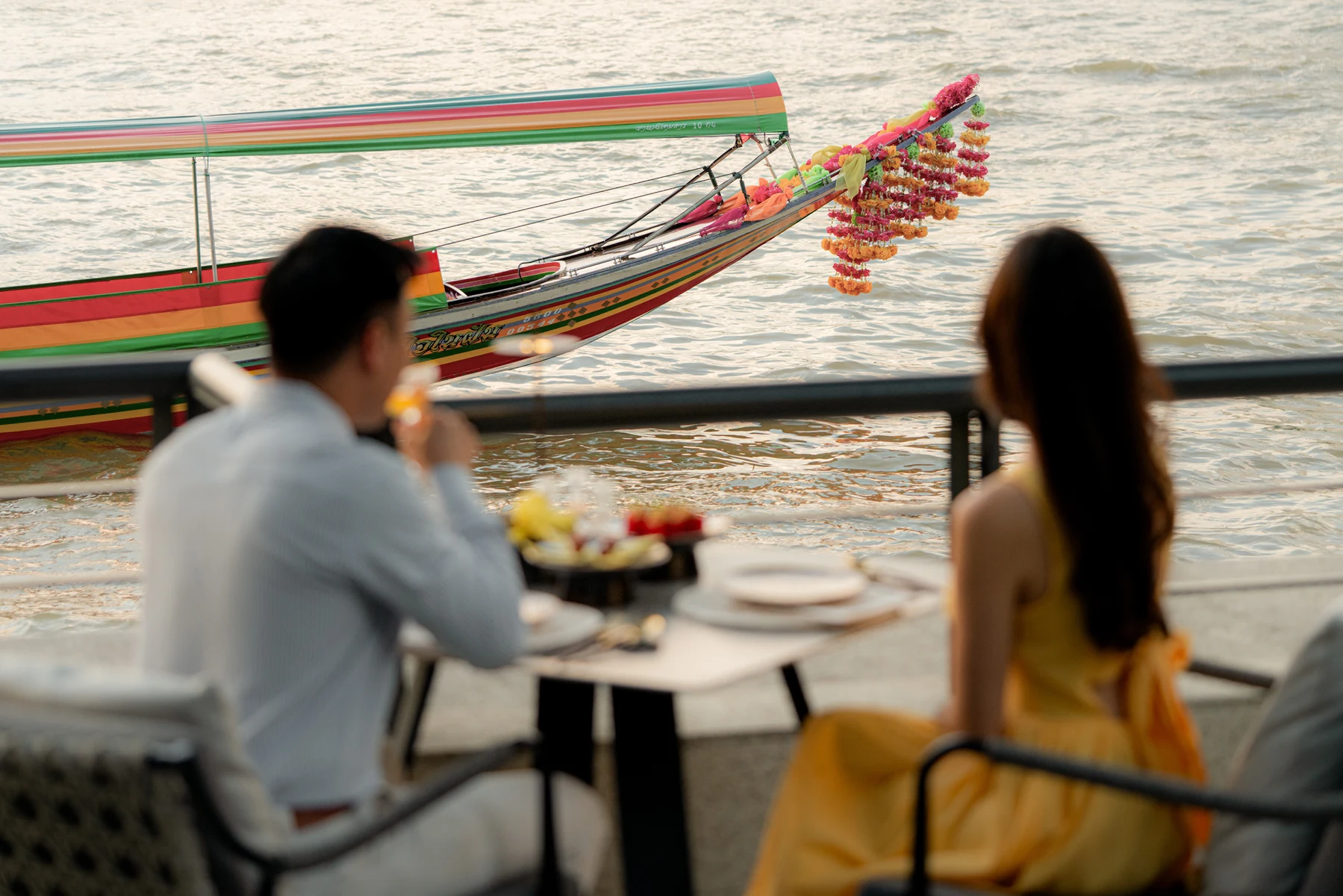 Outdoor tables at Chao Phraya Terrace in Bangkok