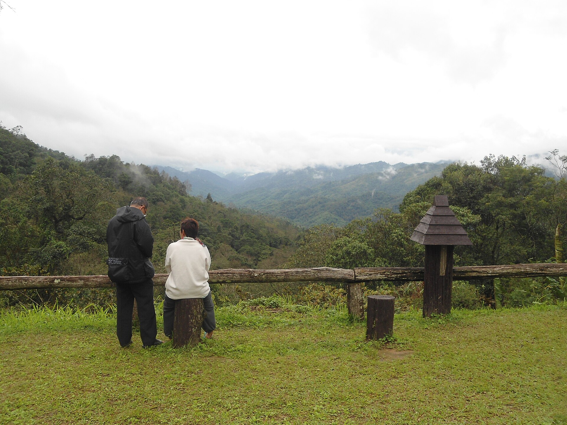 Visitors looking across the landscape from Chong Yen viewpoint