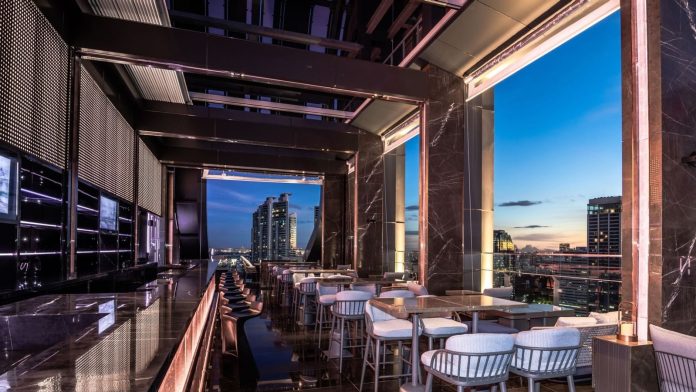Cooling Tower Rooftop Bar view Open-air seating and skyline view at Cooling Tower Rooftop Bar