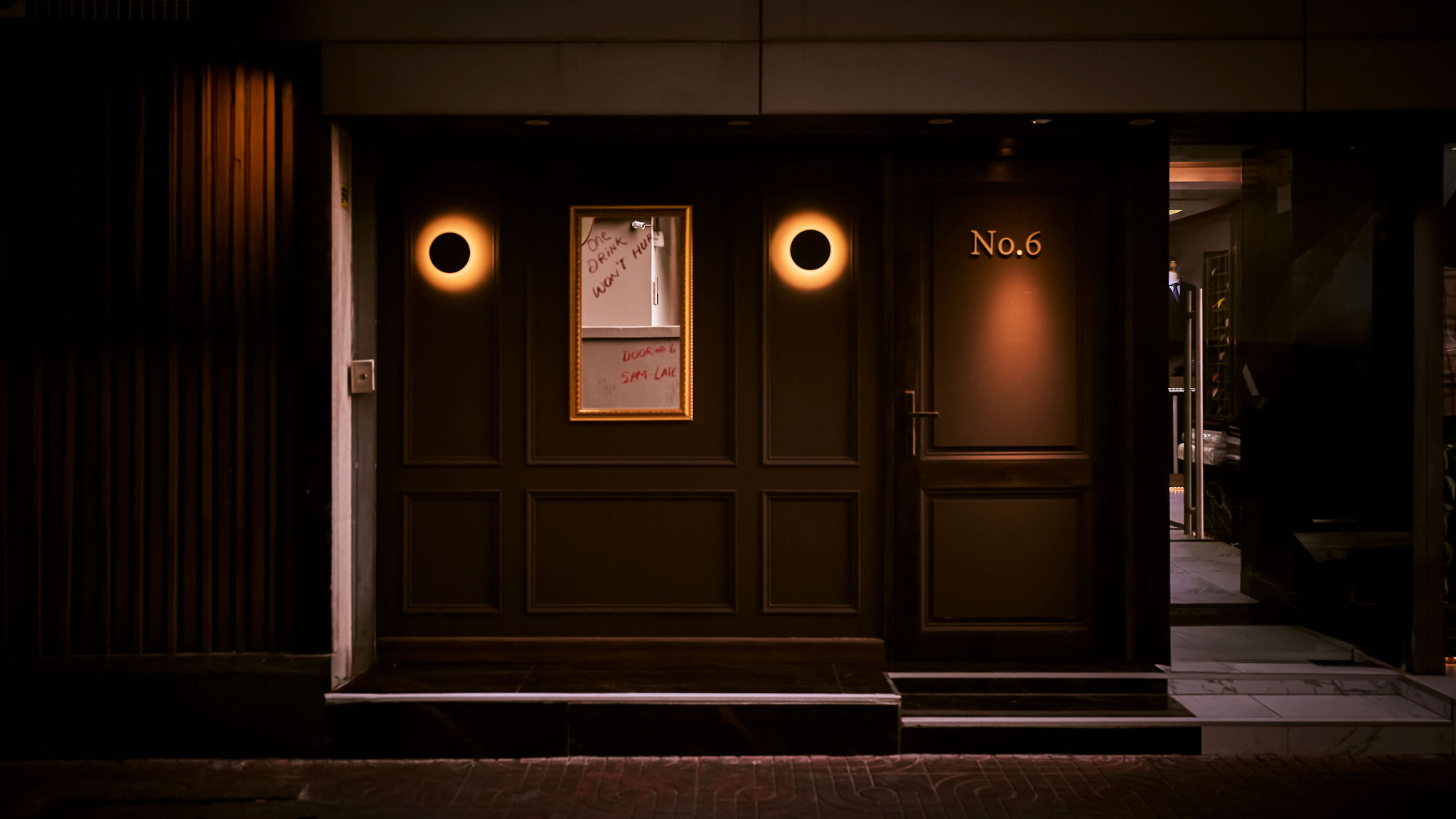 Understated entrance to Door No.6 in Sukhumvit Soi 6