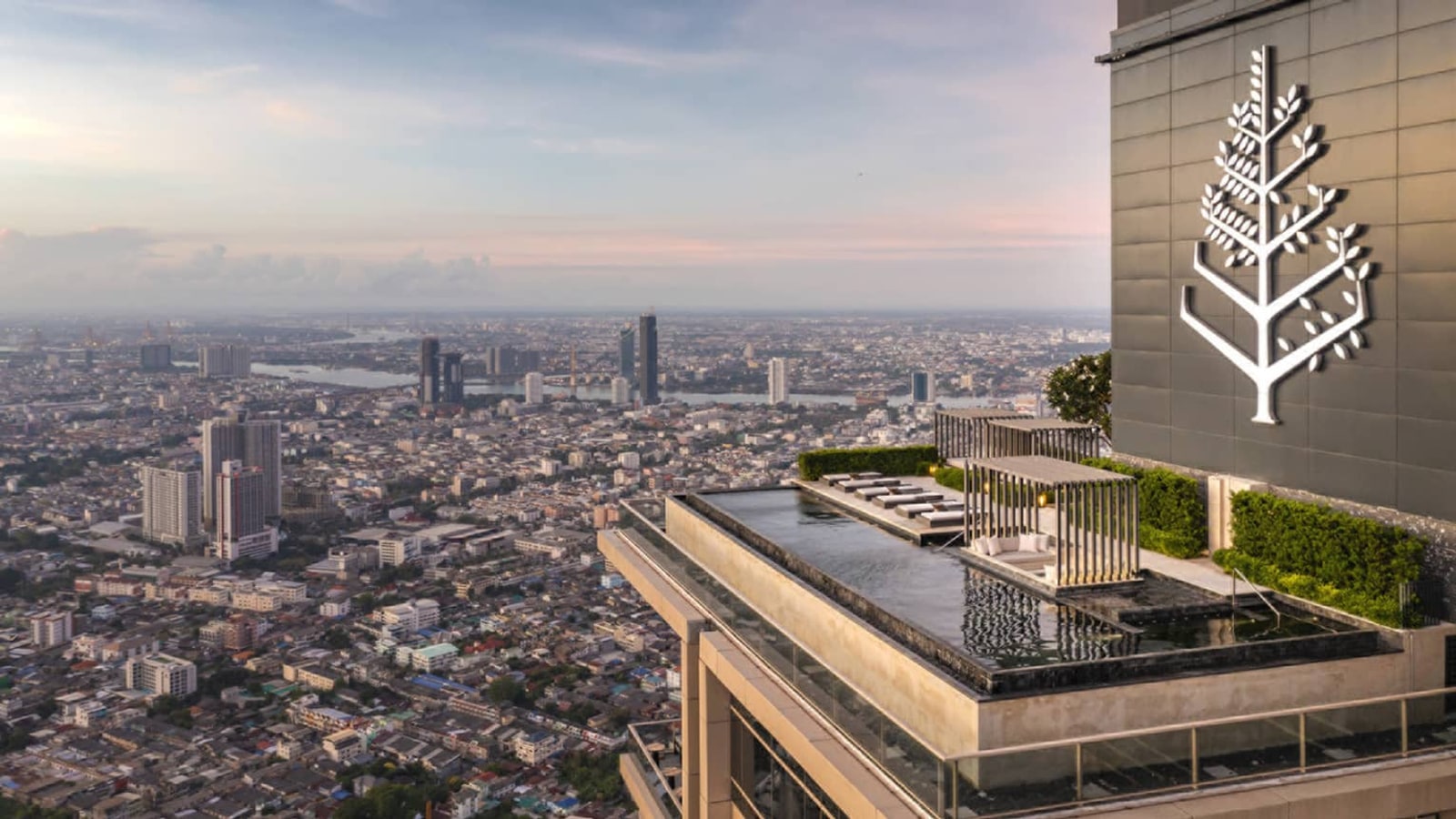 Elevated outdoor terrace and Bangkok skyline at Four Seasons Private Residences