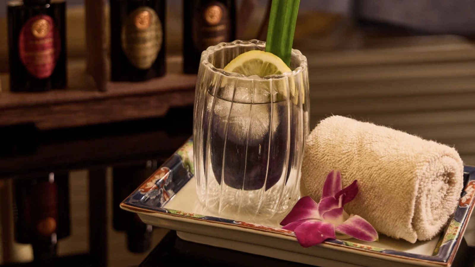 Herbal drink and towel at HARNN Heritage Spa Surawong
