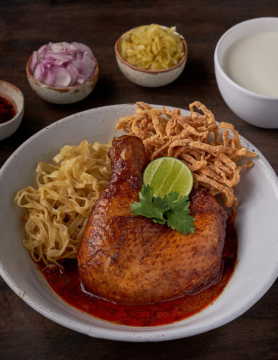 Khao soi with chicken leg and crisp noodles at Kiti Panit