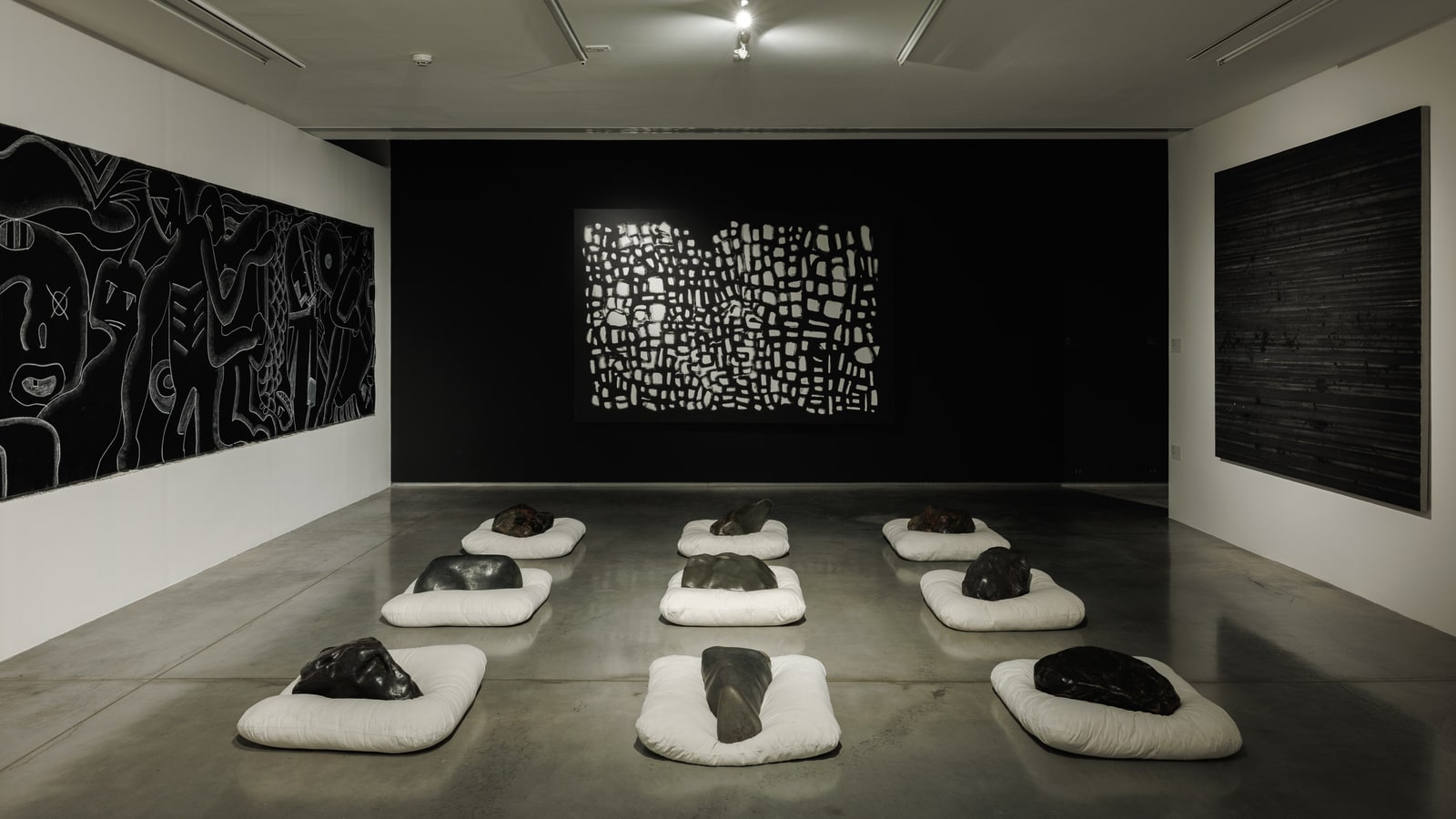 Contemporary art installation in a white MAIIAM gallery