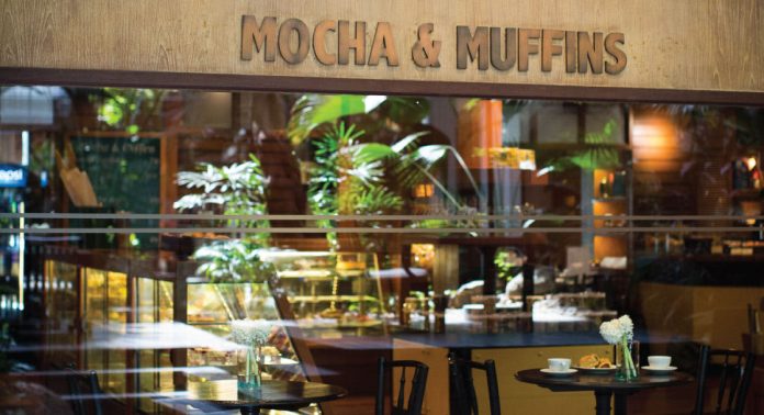 Pastry counter and indoor seating at Mocha and Muffins in Anantara Siam Bangkok