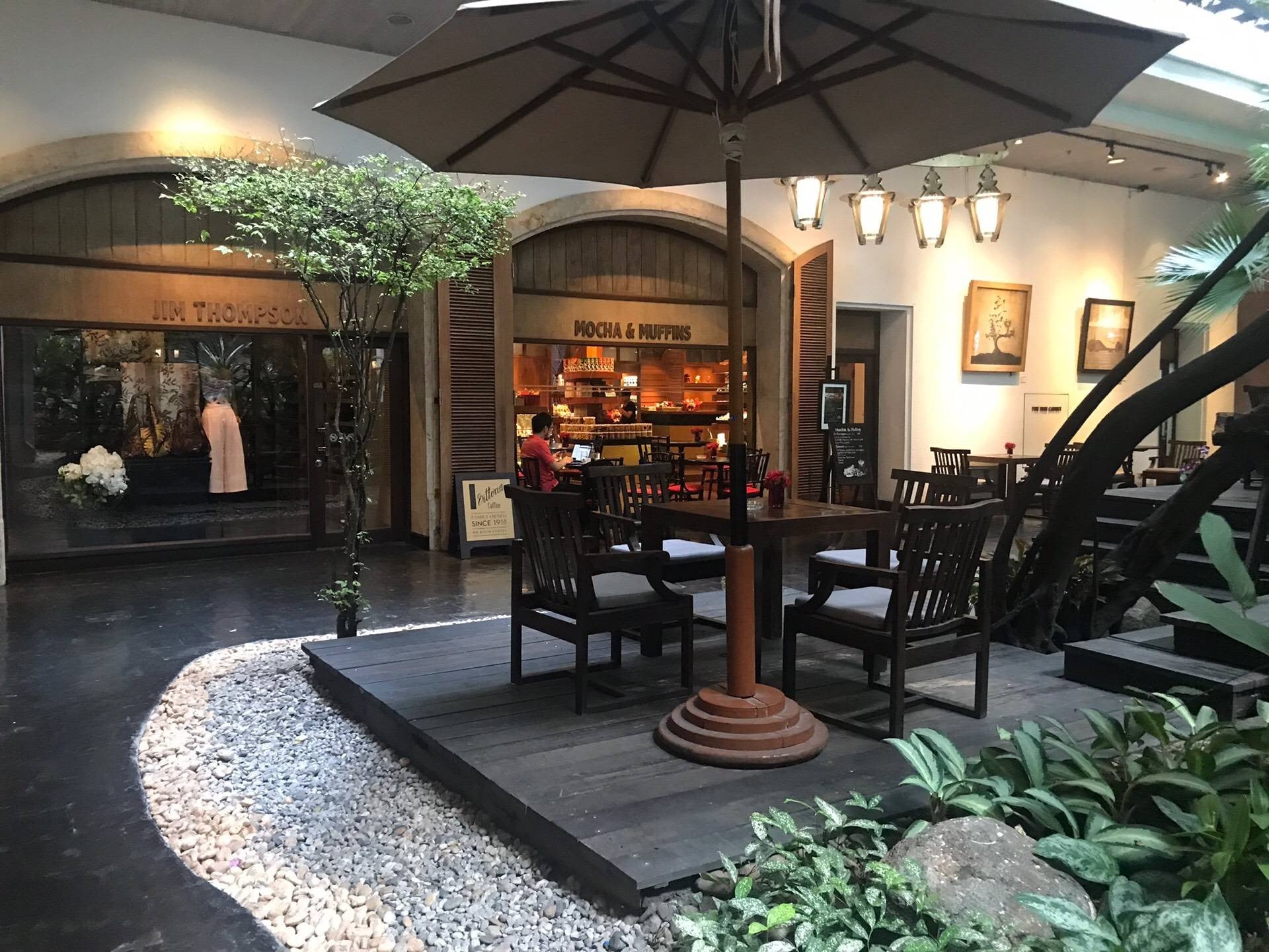 Garden courtyard seating beside Mocha and Muffins