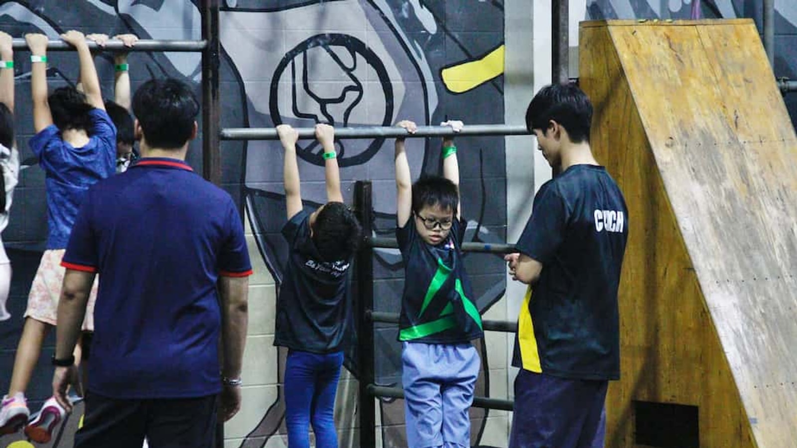 Children practising parkour with coaches in Bangkok
