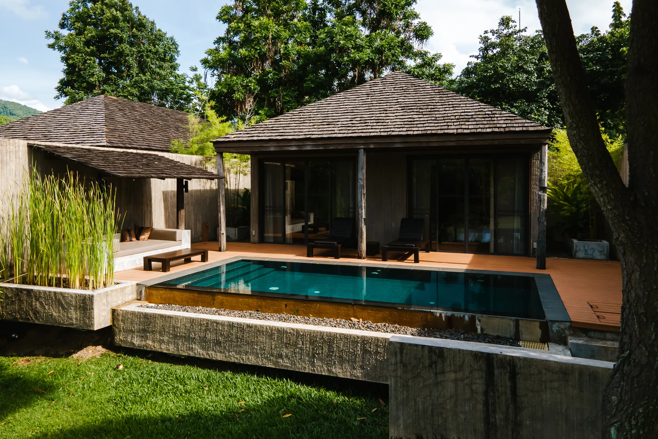 Interior and outdoor connection in a MUTHI MAYA Forest Pool Villa