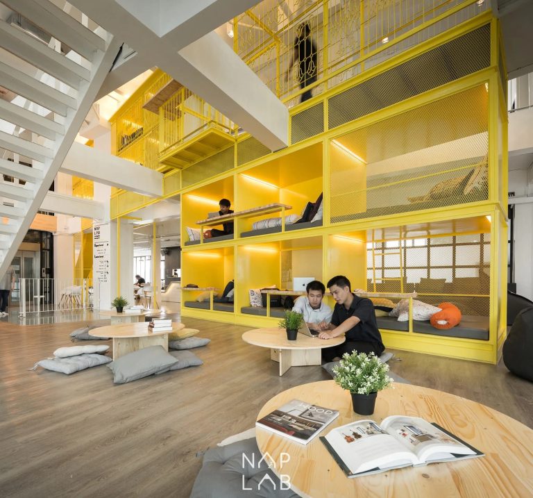 Yellow desk and nap modules inside NapLab Chula