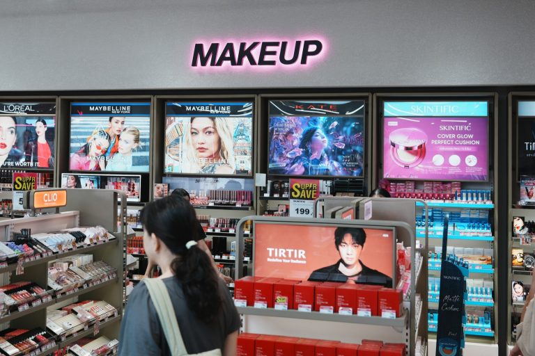 Makeup shelves inside a One Bangkok beauty retailer