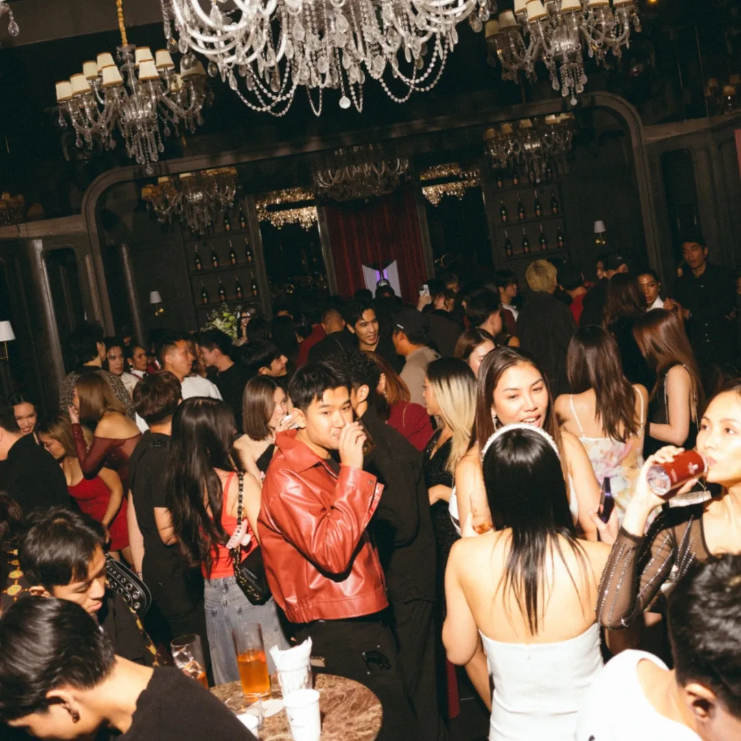 Guests on a busy music night at Red Door Bangkok