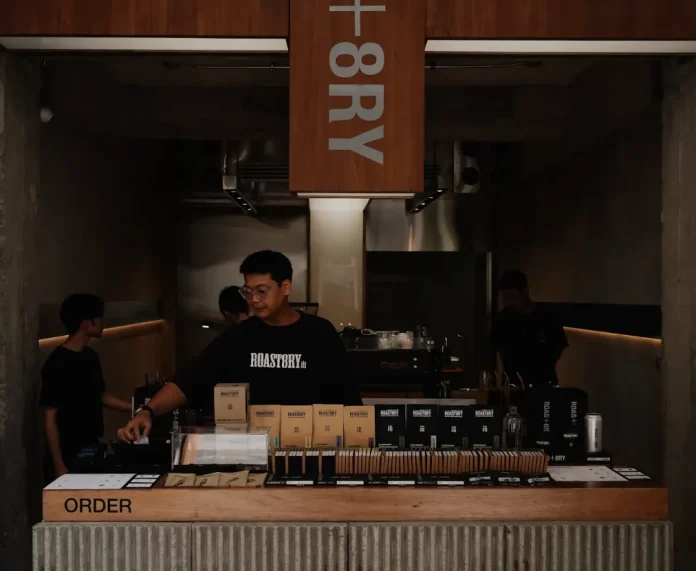 Roast8ry BKK coffee counter Baristas working at the Roast8ry BKK coffee counter near Yaowarat