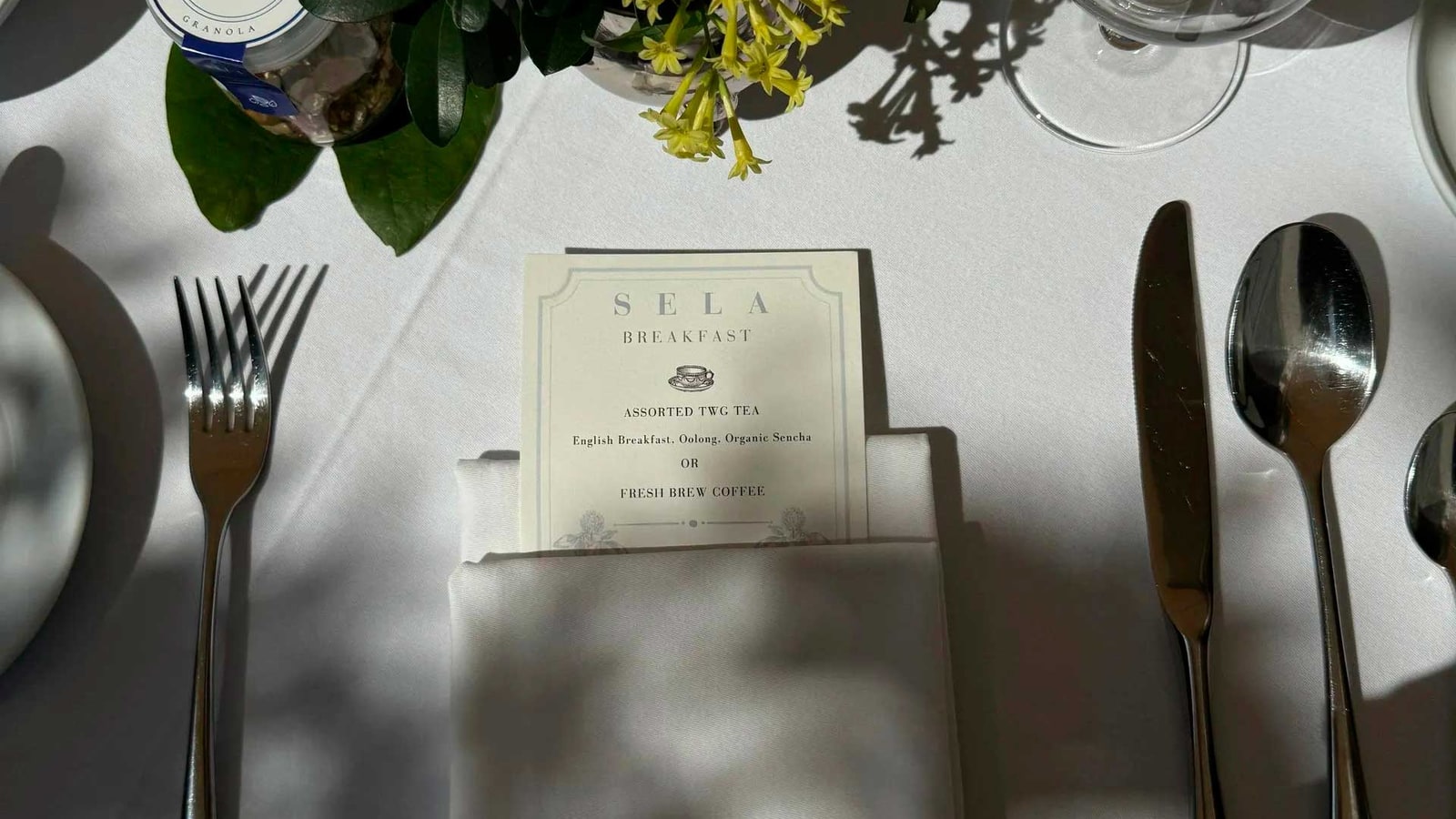 Table setting and menu at Sela Chiang Mai
