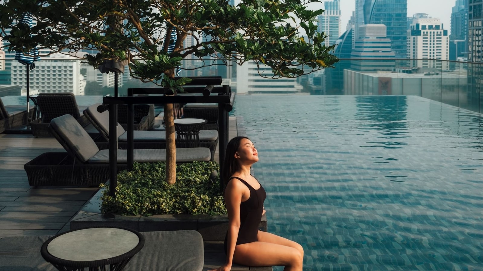 Restaurant seating inside Sindhorn Midtown Bangkok