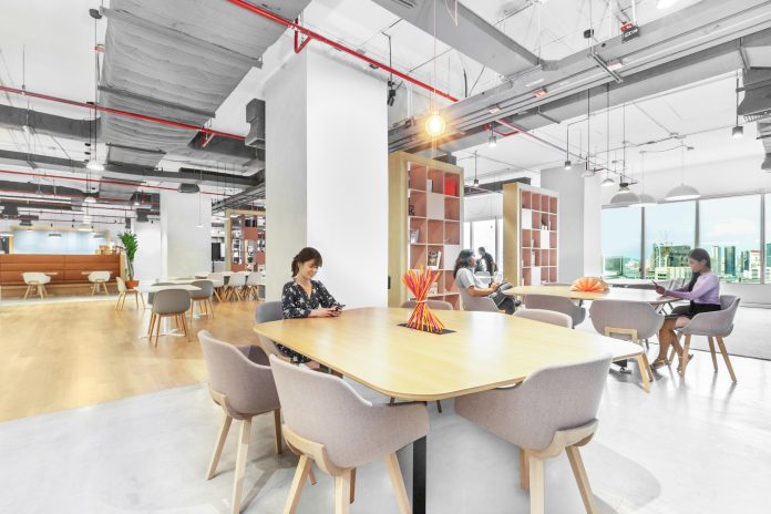 Bright shared tables and seating at Spaces Chamchuri Square