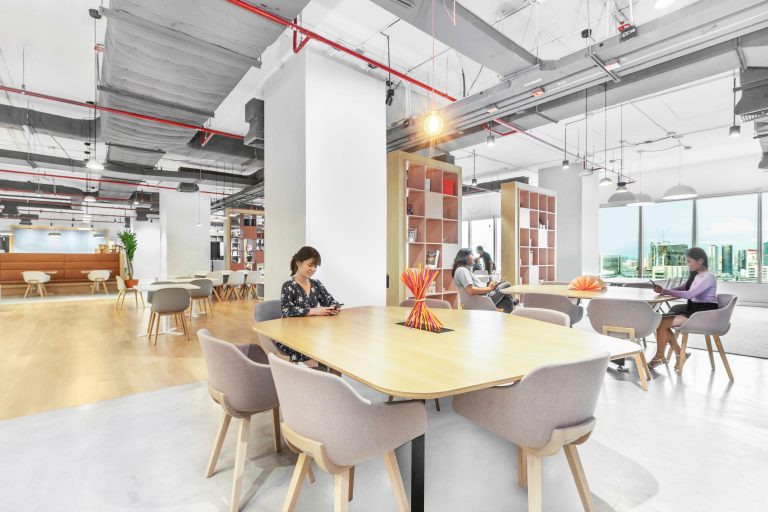 Bright shared tables and seating at Spaces Chamchuri Square