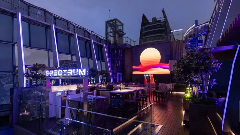 Spectrum Lounge and Bar rooftop terrace glowing above Bangkok at night