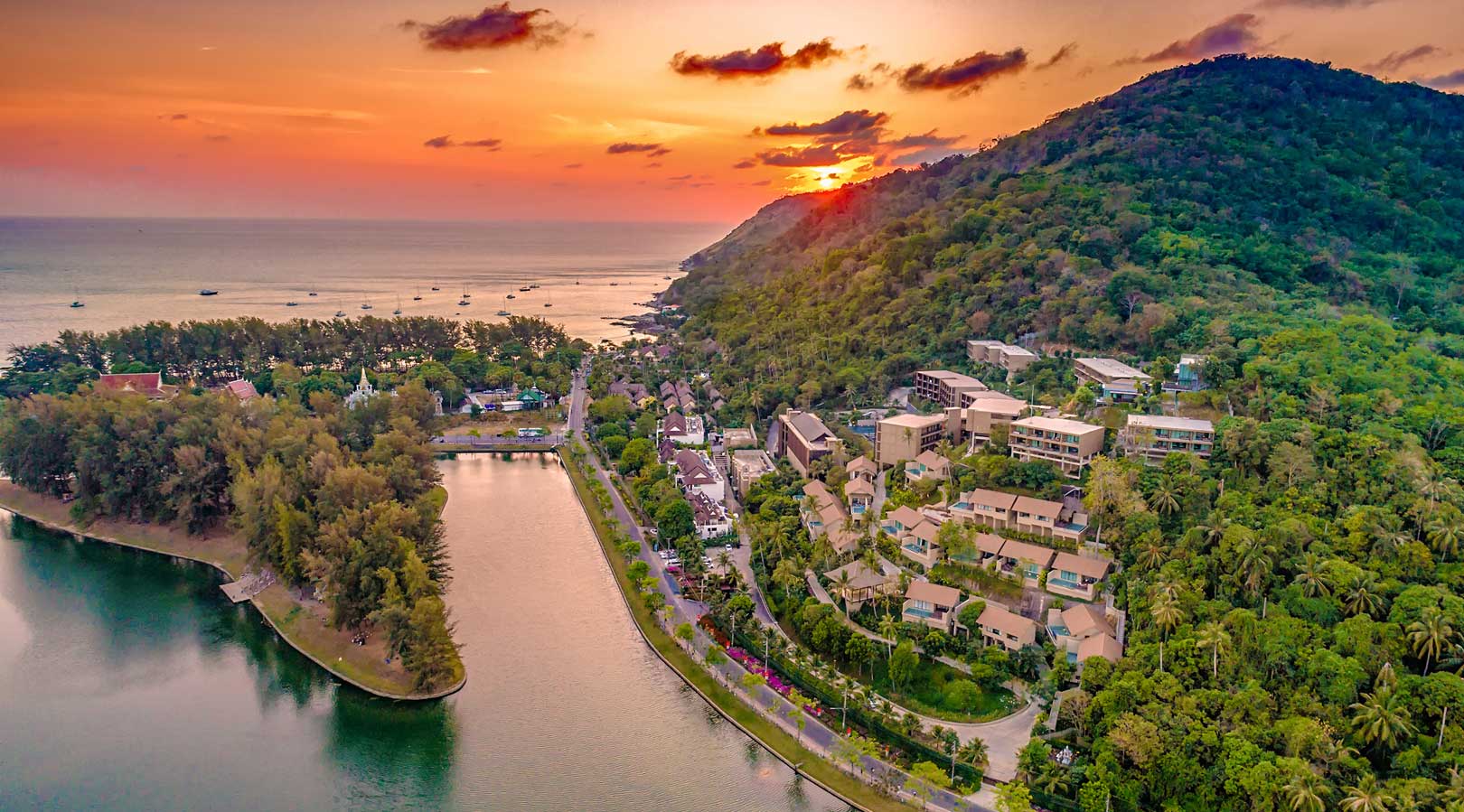 Aerial view of SUNSURI Phuket beside Nai Harn landscape