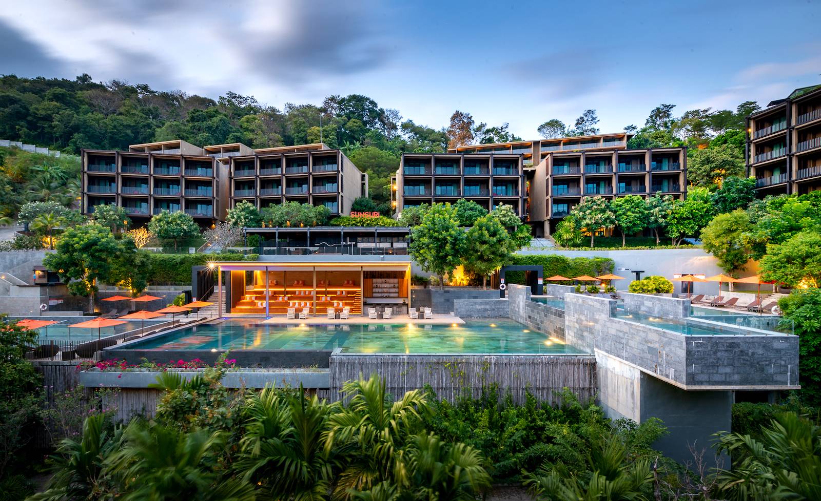 SUNSURI Phuket hillside buildings and swimming pools