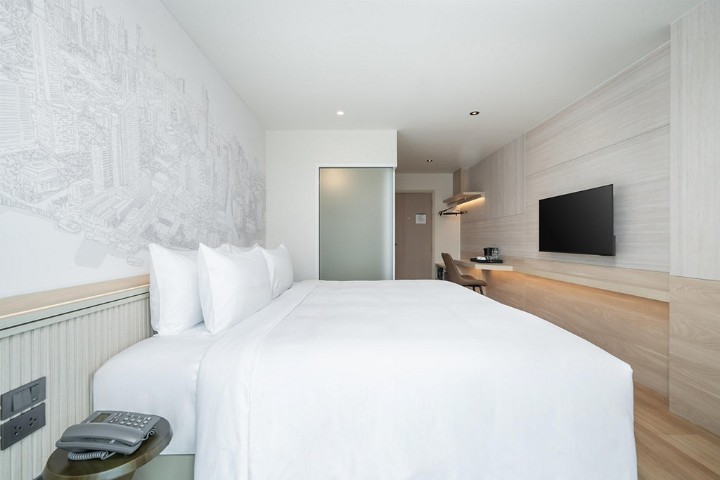 Deluxe room television wall at SureStay Siriraj Bangkok