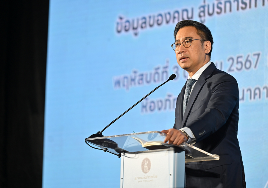 Speaker discussing customer data and financial services in Thailand