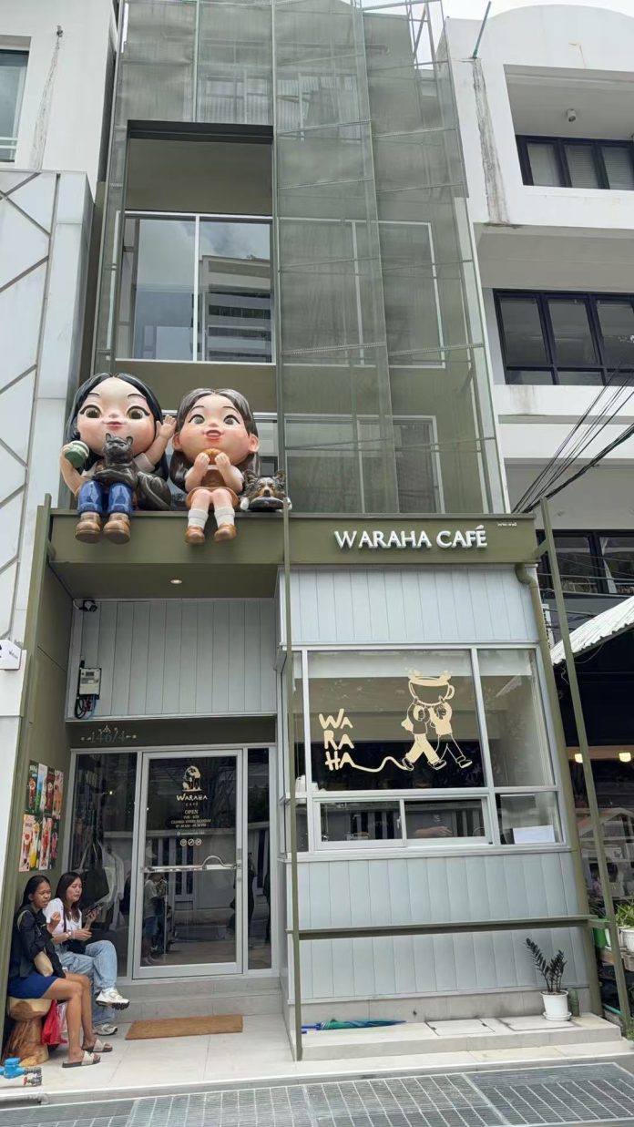 Waraha Cafe facade Green and white facade of Waraha Cafe in Sukhumvit 39