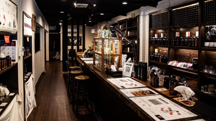 Y'EST WORKS Asok Coffee bar and retail shelves at Y'EST WORKS Asok